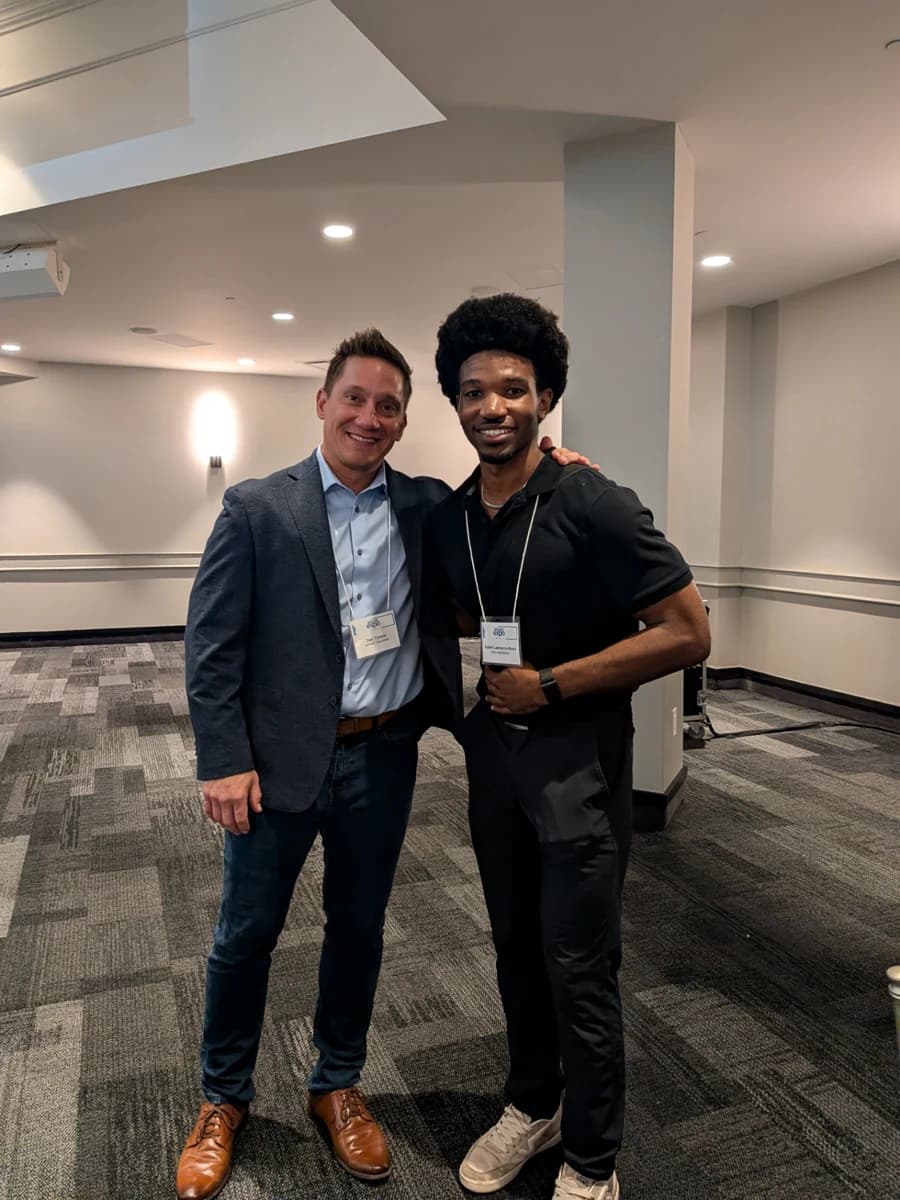 Kaleel with another attendee at a professional networking event